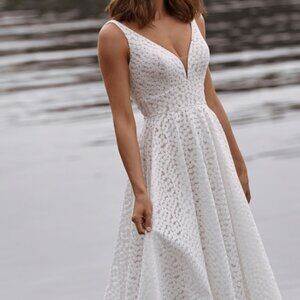 Wedding Dress (Madi Lane Bridal) ~ size 12 (Never worn) with slight alterations.